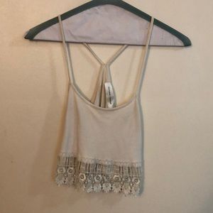 White crop top with lace accents